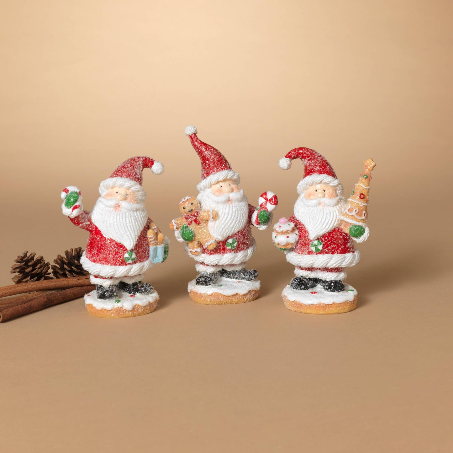 The Gerson Companies - Christmas 6.5"H Resin Holiday Santa, 3 A