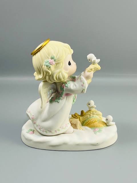Precious Moments "Christmas is Loving" Dated Porcelain Figurine
